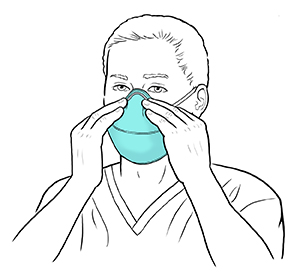 Proveedor de atención médica colocándose una mascarilla sobre la nariz y la boca.